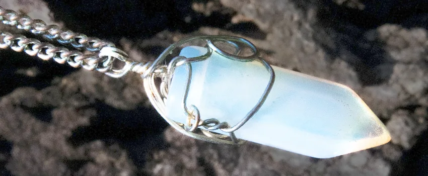A cottagecore accessory necklace featuring wire and crystal.